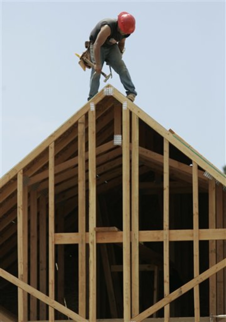 In this April 19, 2010 photo, a worker is shown building a new home in Palo Alto, Calif. Sales of new homes posted another large gain in April as buyers rushed to sign contracts before government tax credits expired at the end of the month.(AP Photo/Paul Sakuma)