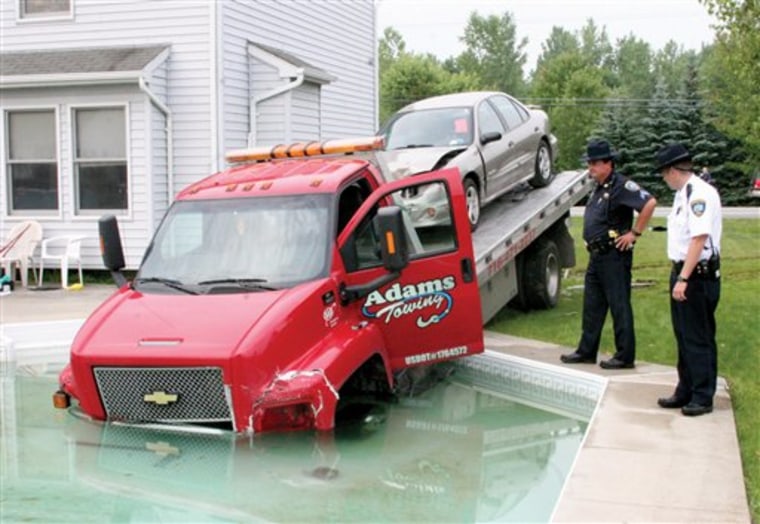 Texting Tow Truck In Pool