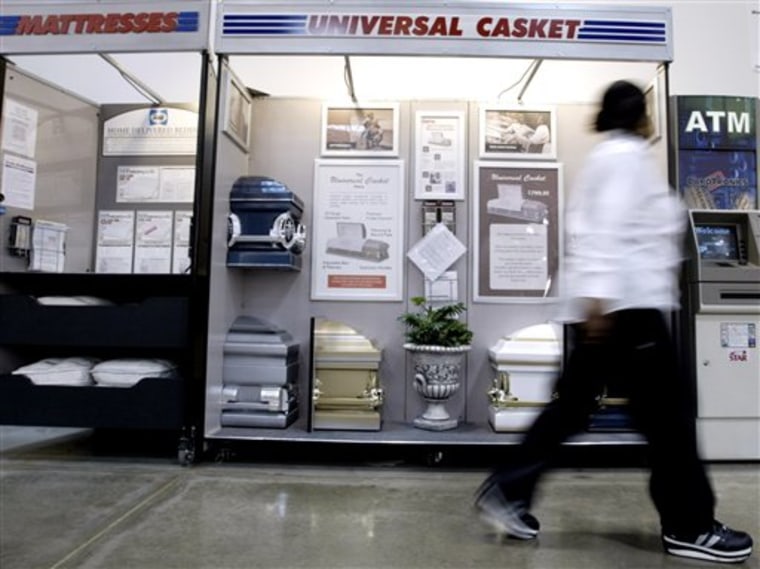 A Costco store offers six models of caskets made by Universal Casket. On Monday, the warehouse retailer started test marketing caskets at two stores in the Chicago area.