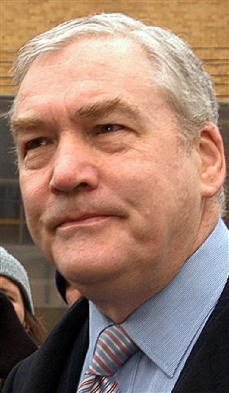 Conrad Black, former CEO and chairman of Hollinger International, enters the New Castle County Courthouse in Wilmington, Del., earlier this year. Hollinger was "systematically manipulated" by its controlling shareholders, according to a report filed Tuesday with the Securities and Exchange Commission.