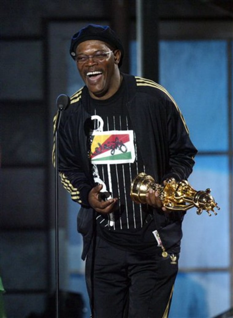 Samuel L. Jackson laughs as he accepts his award for best performance by a male human for his work in the video game 'Grand Theft Auto: San Andreas' at Spike TV's Video Game Awards in Santa Monica, Calif. on Tuesday.