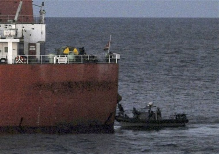 South Korean naval special forces approach and board the South Korean cargo ship Samho Jewelry in a military operation in the Arabian Sea on Jan. 21. In the daring and rare raid, South Korean special forces stormed the hijacked freighter, rescuing all 21 crew members and killing eight assailants.