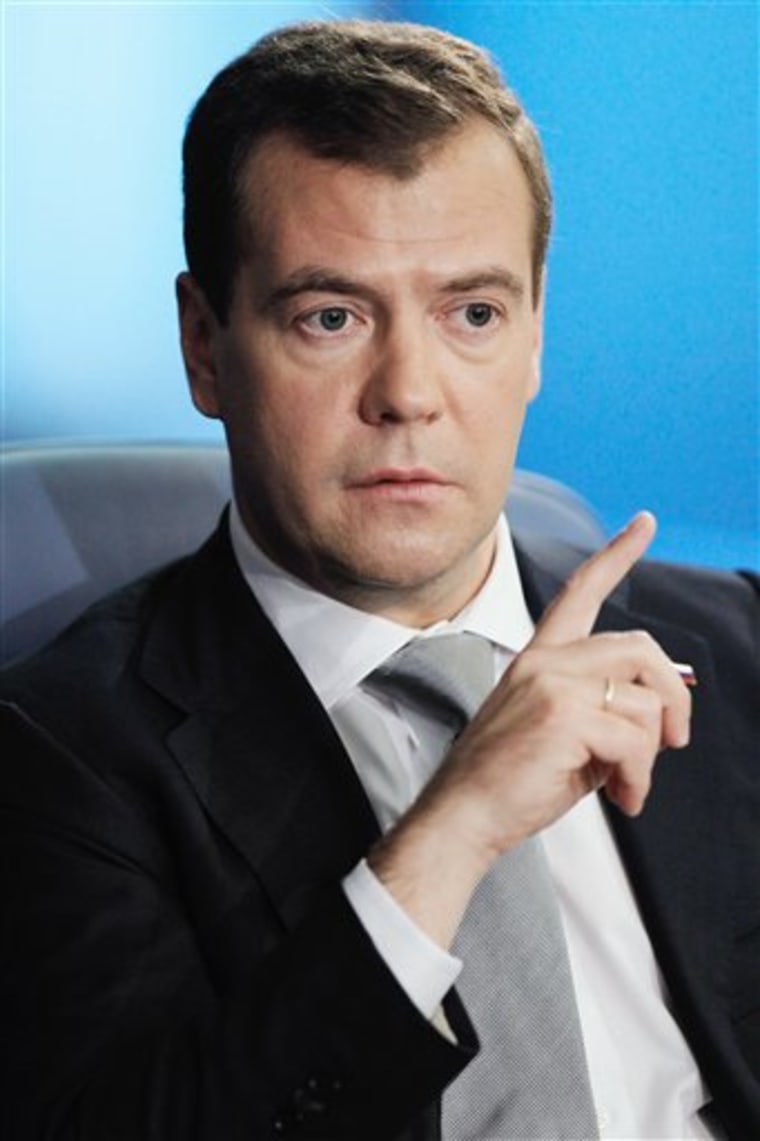 Medvedev wants 2nd term, but won't challenge Putin