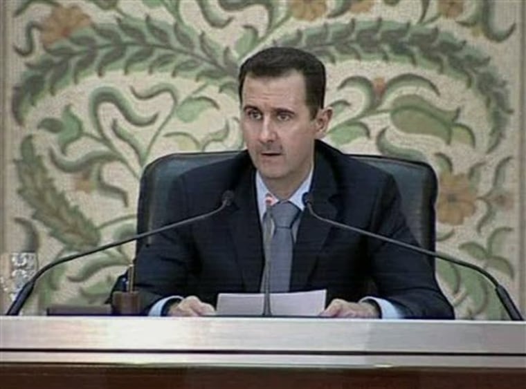 In this image from Syrian state television President Bashar Assad makes a speech in front of his cabinet in Damasus, Syria on Saturday, April 16. Assad said he expects the government to lift the country's decades-old emergency laws next week. Lifting the state of emergency has been a key demand during a wave of protests over the past four weeks, which have posed the most serious challenge yet to Assad's authoritarian regime. 