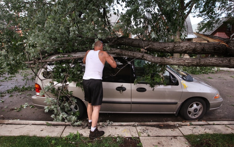 Chicago Area Cleans Up After Severe Storms Cause Power Outages And Dam