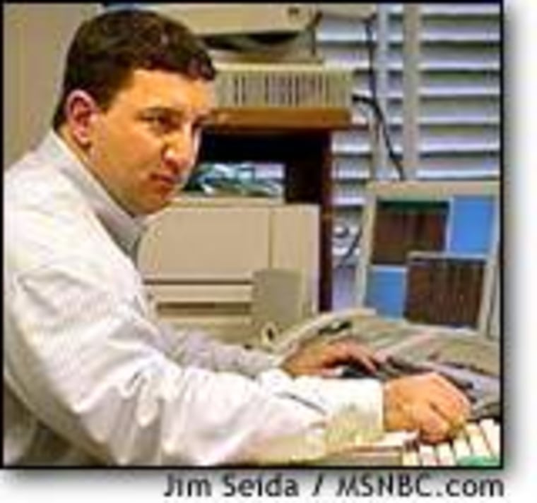 Jay Cohen, in a photo taken in February 2001, works as a stock trader in San Francisco while awaiting a decision on his appeal.