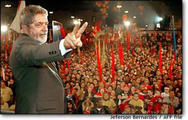 Brazilian presidential candidate Luiz Inacio "Lula" da Silva flashes a victory sign during a campaign stop in Porto Alegre on Monday.