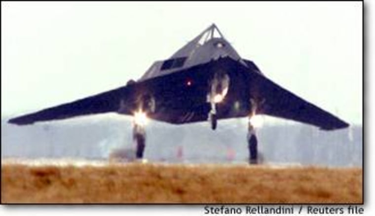 A U.S. Air Force F-117 Stealth figthter lands at NATO's Aviano Air Base in northern Italy, in February. The single-seat aircraft can carry two, 2000-pound laser-guided bombs.
