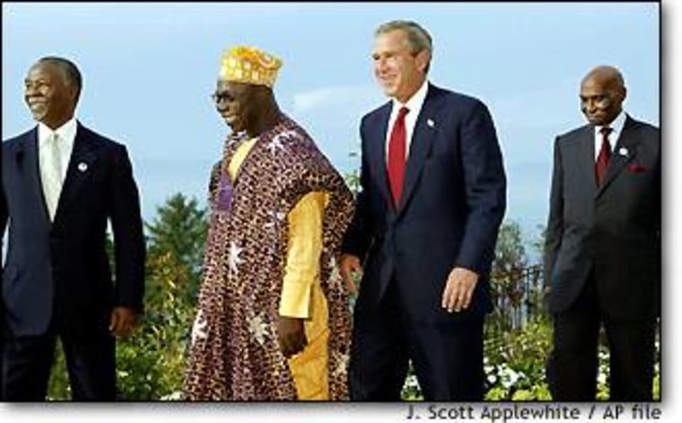 President Bush met some of the leaders he will see during this week's trip at the G-8 Summit in Evian, France, in June. From left, they are South African President Thabo Mbeki, Nigeria's President Olusegun Obasanjo, Bush, and President of Senegal Abdoulaye Wade.