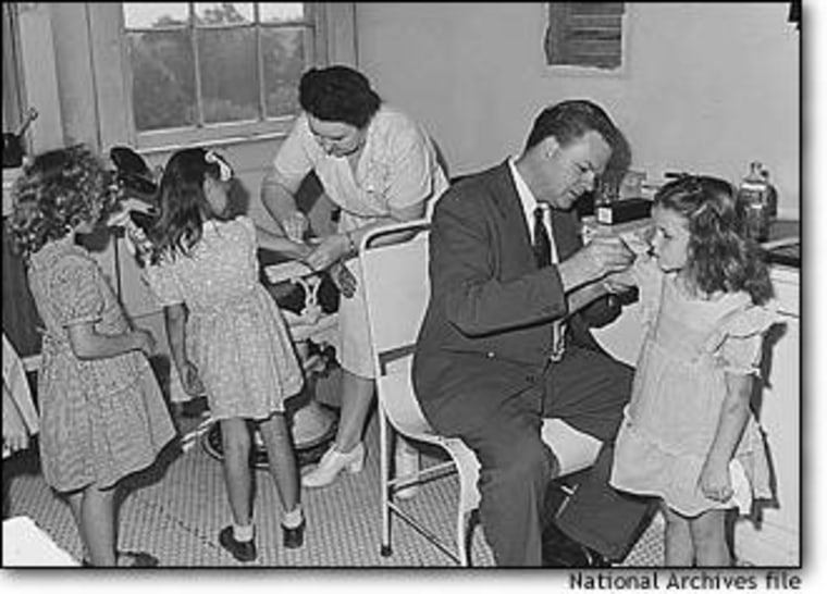 Miners' children being vaccinated for smallpox in 1946. Immune response is detected in vaccinated people for up to 75 years, according to researchers.