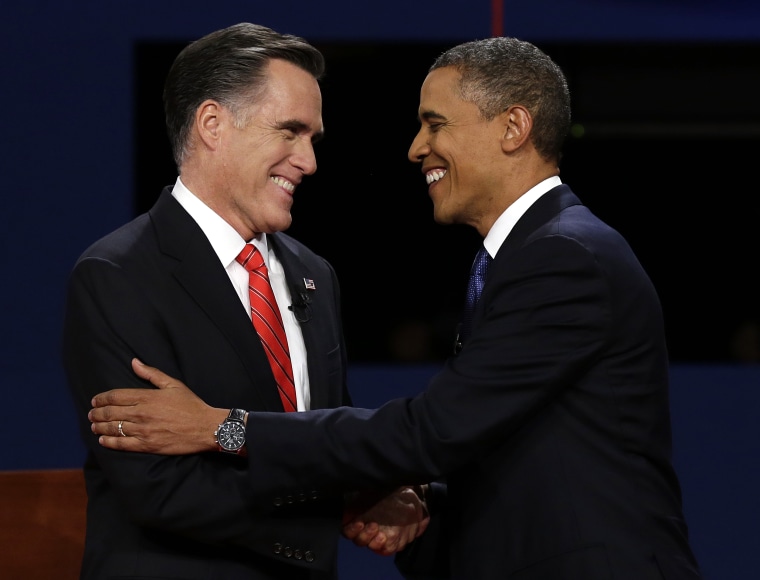 Republican presidential nominee Mitt Romney and President Barack Obama shake hands during the first presidential debate at the University of Denver, Wednesday, Oct. 3, 2012, in Denver. (AP Photo/Charlie Neibergall)