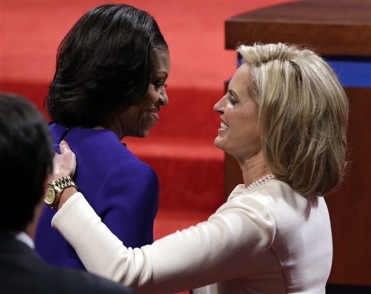 First lady Michelle Obama greets Ann Romney before the first presidential debate at the University of Denver, Wednesday, Oct. 3, 2012, in Denver. (AP Photo/Charlie Neibergall)