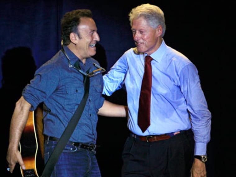 Former President Bill Clinton and Bruce Springsteen at a campaign event for President Obama on Thursday in Parma, Ohio. (Tony Dejak/AP Photo)