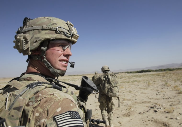 A platoon sergeant of the U.S. Army soldiers of 2nd Battalion, 1st Infantry Regiment, looks at comrades during a joint U.S.-Afghan military patrol in Arghandab Valley in Kandahar province, southern Afghanistan October 22. (Photo: Erik de Castro/Reuters)