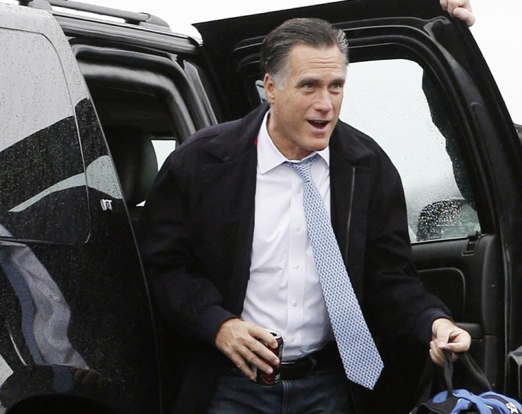Republican presidential candidate and former Massachusetts Gov. Mitt Romney gets out of his vehicle to board his campaign plane in Akron-Canton Regional Airport, North Canton, Ohio, Saturday, Oct. 27, 2012, as he travels to Pensacola, Fla., for...