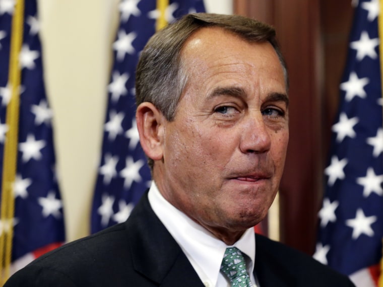 House Speaker John Boehner of Ohio, pauses between ceremonial swearing-ins of new House members, on Capitol Hill. (AP Photo/Alex Brandon)