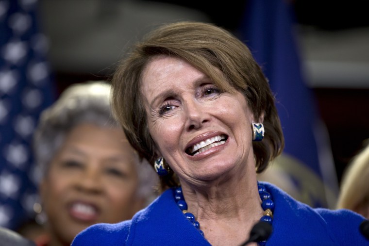 House Minority Leader Nancy Pelosi of Calif., accompanied by House women Democrats, announces that she wants to remain as the top Democrat in the House of Representatives, Wednesday, Nov. 14, 2012, during a news conference on Capitol Hill in Washington...