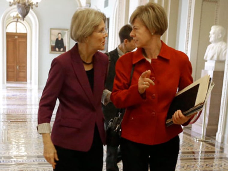 Senator-elect Elizabeth Warren and Senator-elect Tammy Baldwin on Capitol Hill in Washington on Tuesday.  (Pablo Martinez Monsivais/AP Photo)