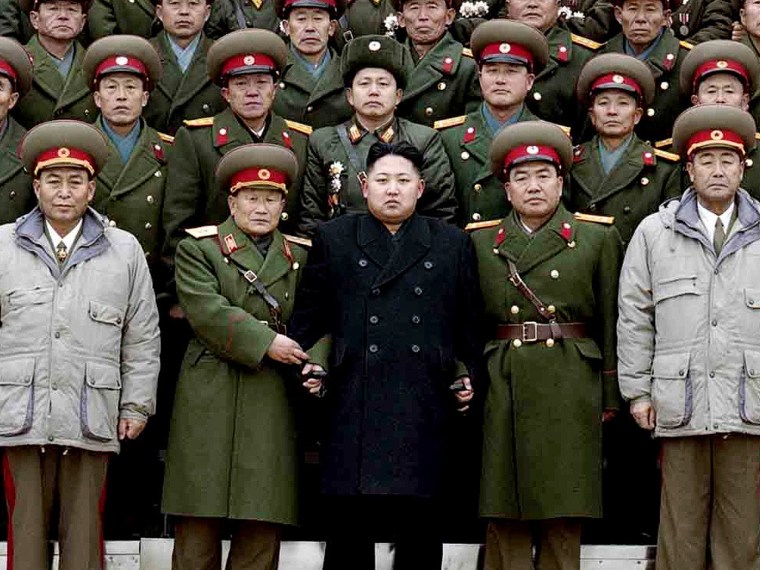 File Photo: This picture taken by North Korea's official Korean Central News Agency (KCNA) on January 1, 2012 shows new North Korean leader Kim Jong-Un (front row-C) posing for photos with soldiers of the Seoul Ryu Kyong Su 105 Guards Tank Division of...