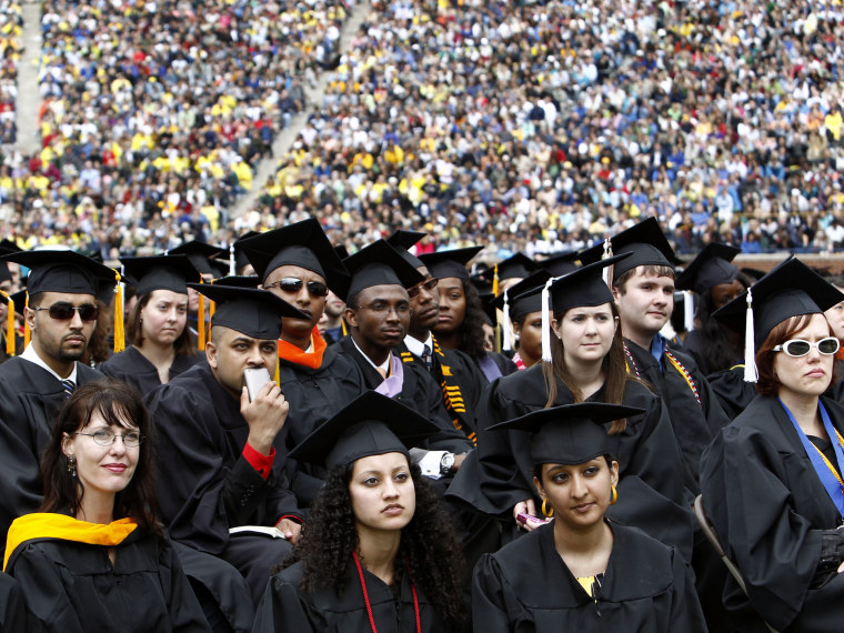 File Photo: Graduating students listen to President Obama speak at the University of Michigan commencement ceremony, May 1, 2010. (Photo by Kevin Lamarque/Reuters/Files)