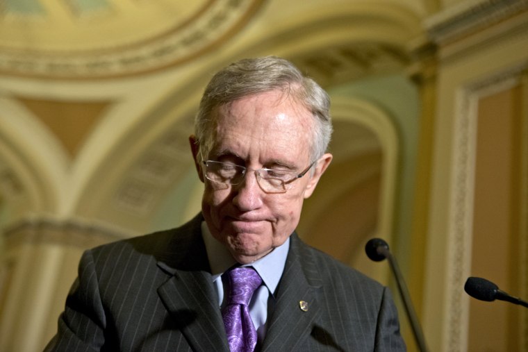 Senate Majority Leader Harry Reid of Nev. pauses as he meet with reporters  on Capitol in Washington, Tuesday, Nov. 27, 2012, following a Democratic strategy session.  (AP Photo/J. Scott Applewhite)