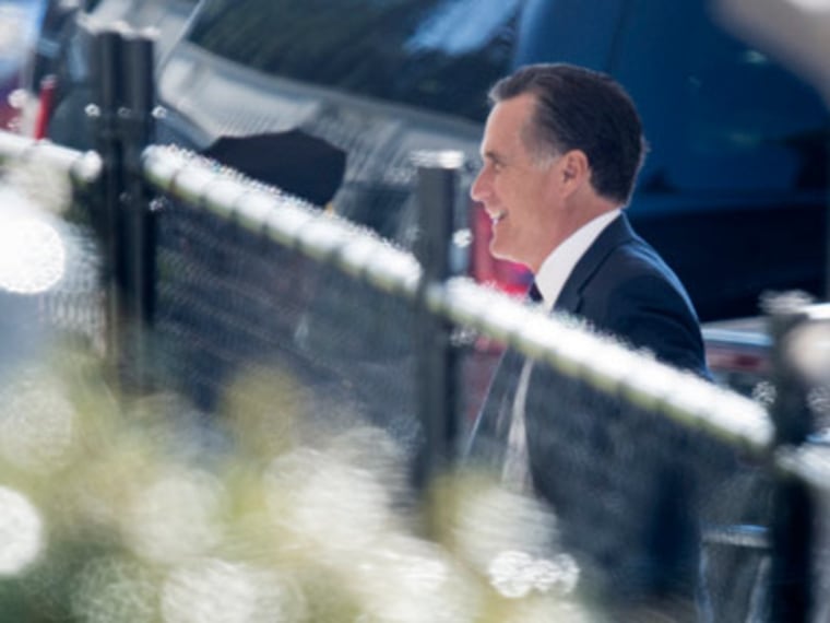 Former Republican presidential candidate Mitt Romney arriving for lunch at the White House on Thursday in Washington. (Brendan Smialowski/ AFP Photo)
