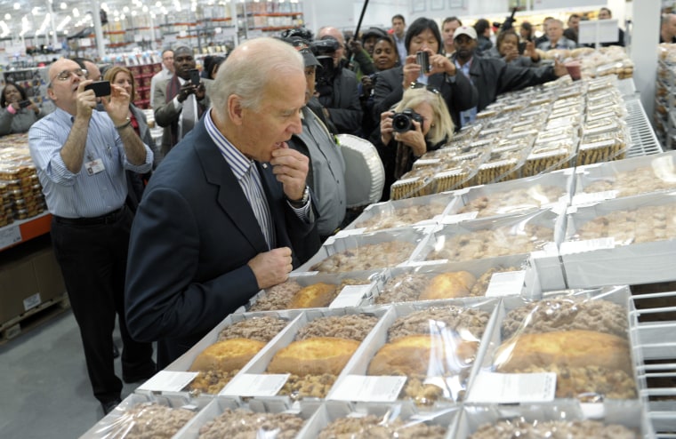 Vice President Joe Biden looks over a selection of items in the bakery section while shopping at a Costco in Washington, Thursday, Nov. 29, 2012 (Photo: AP/Susan Walsh)