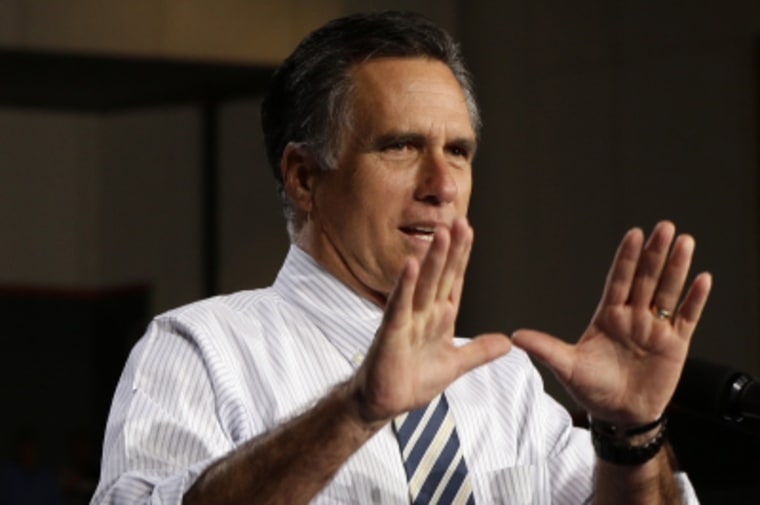 Republican presidential candidate, former Massachusetts Gov. Mitt Romney makes the University of Miami sign as he campaigns at the Bank United Center, at The University of Miami, in Coral Gables, Florida, Wednesday, Oct. 31, 2012. (AP Photo/Charles...