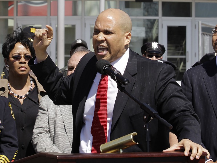 File Photo: Newark Mayor Cory Booker talks during a news conference in in Newark, N.J. in April 2012. (Photo by Julio Cortez/AP Photo File)