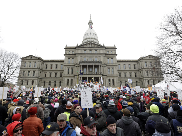 Protesters gather for a rally at the State Capitol in Lansing, Mich., Tuesday, Dec. 11, 2012. The crowd is protesting right-to-work legislation passed last week. Michigan could become the 24th state with a right-to-work law next week. Rules required a...
