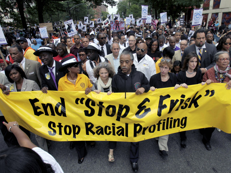 File Photo: The Rev. Al Sharpton, center, walks with demonstrators during a silent march to end the \"stop-and-frisk\" program in New York, Sunday, June 17, 2012. Thousands of protesters from civil rights groups walked down New York City’s Fifth Avenue...