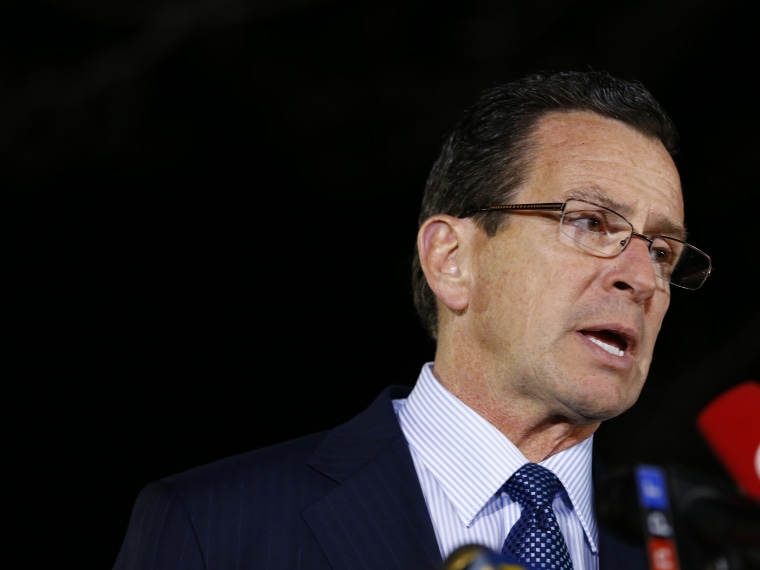NEWTOWN, CT - DECEMBER 14:  Connecticut Gov. Dan Malloy briefs the media on the elementary school shootings during a press conference at Treadwell Memorial Park on December 14, 2012 in Newtown, Connecticut. (Photo by Jared Wickerham/Getty Images)