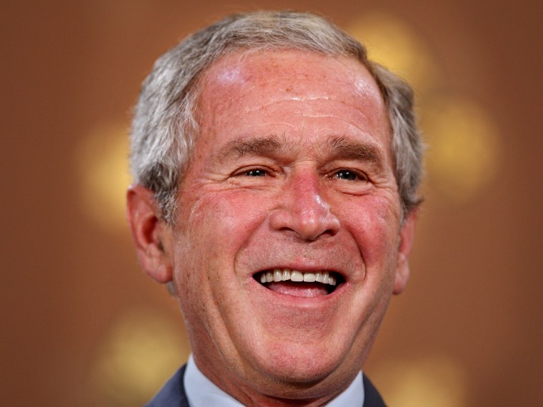File Photo: US President George W. Bush laughs during a joint press conference with Prime Minister Gordon Brown (not in picture)on June 16, 2008 in London. The pair discussed Iraq, Afghanistan and Coalition troop withdrawal. President Bush will finish...