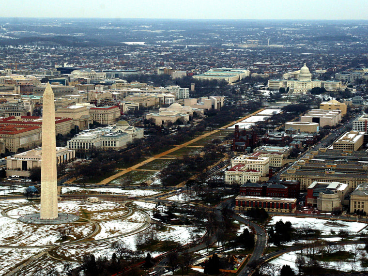 File Photo: This 13 February, 2006 aerial view shows the National Mall looking east from the Washington Monument towards the US Capitol in Washington, DC. (Photo by Karen Bleier/AFP/Getty Images/File)