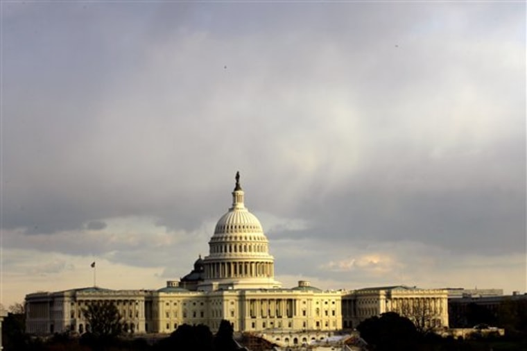 Capitol Hill under the clouds during a sunset  in Washington, Thursday, Nov. 20, 2008..(AP Photo/Jose Luis Magana)