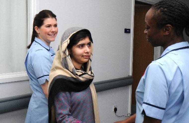 This photo made available by Queen Elizabeth Hospital, Birmingham, England shows Malala Yousufzai saying goodbye as she is discharged from the hospital to continue her rehabilitation at her family’s temporary home in the area, Friday, Jan. 4, 2013. the...
