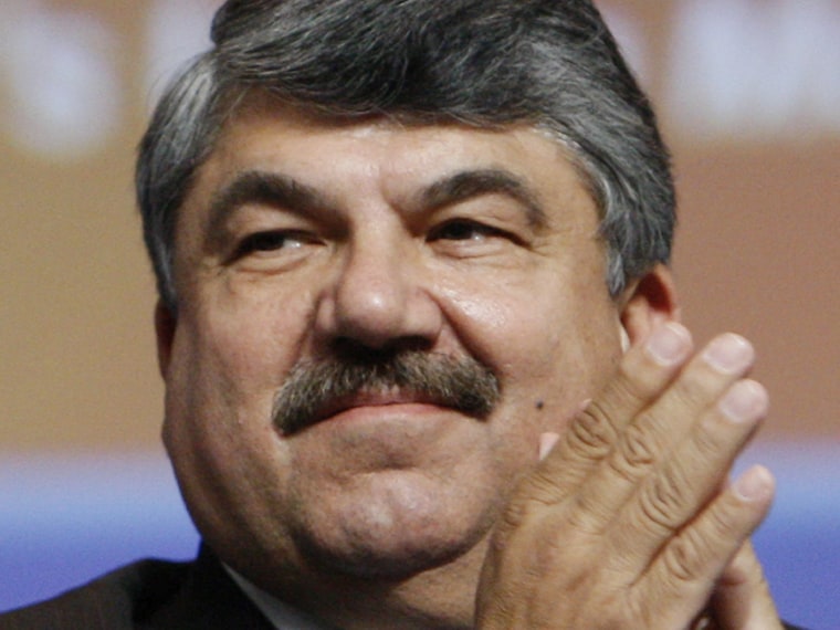 File Photo: In this Sept. 15, 2009 photo, AFL-CIO President Richard Trumka applauds at the David L. Lawrence Convention Center in Pittsburgh. (Photo by Charles Dharapak/AP Photo/File)