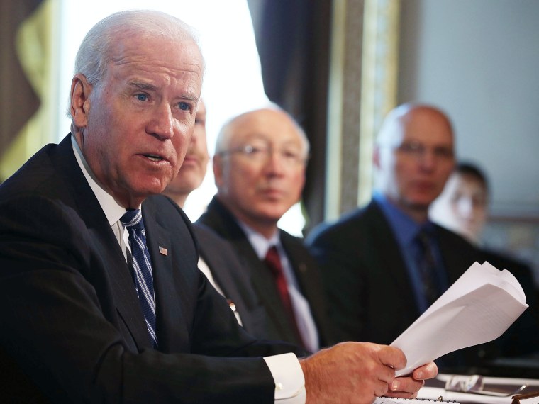 U.S. Vice President Joe Biden (L) makes brief remarks to the press after a meeting with Cabinet members and sportsmen's, wildlife and gun interest groups at the Eisenhower Executive Office Building January 10, 2013 in Washington, DC. U.S. President...