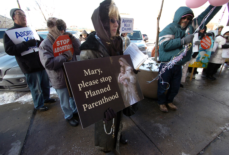 Donna Davis of Scranton, Pa. co-leader of Catholics Defending Life Prayer and Awareness Team, takes part during a \"Stand Up for Life Rally\" held in front of the Planned Parenthood Center on Penn Avenue in downtown Scranton, Pa. on Tuesday, Jan. 22,...