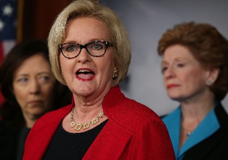 U.S. Sen. Claire McCaskill, D-Mo., speaks while flanked by Sen. Maria Cantwell, D-Wash., (L), and Sen. Debbie Stabenow, D-Mich., during a news conference on violence against women, on December 18, 2012 in Washington, DC. The Democratic female Senators...