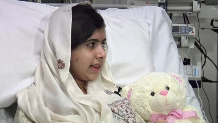 Pakistani schoolgirl, Malala Yousufzai, who was shot in the head by the Taliban for advocating girls' education, is seen sitting in her hospital bed in this undated still picture taken from video provided by the Queen Elizabeth Hospital, in Birmingham,...