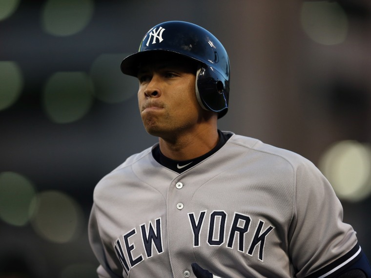 File Photo: Alex Rodriguez #13 of the New York Yankees reacts as he walks back towards the dugout after he pinch hit and flied out in the top of the sixth inning against the Detroit Tigers during game four of the American League Championship Series at...