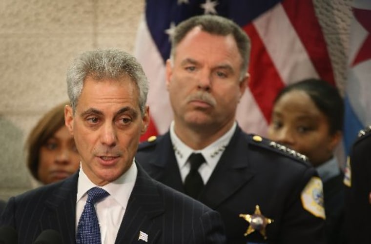File Photo: Chicago Police Superintendant Garry McCarthy (R) listens as Mayor Rahm Emanuel (L) discusses a plan to reassign 200 police officers from administrative duties back to patrol duties during a press conference on January 31, 2013 in Chicago,...