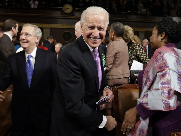 Vice President Joe Biden, Senate Minority Leader Mitch McConnell of Ky., left, Rep. Shelia Jackson Lee, D-Texas, right, and others arrive on Capitol Hill in Washington, Tuesday, Feb. 12, 2103, for President Barack Obama's State of the Union address...
