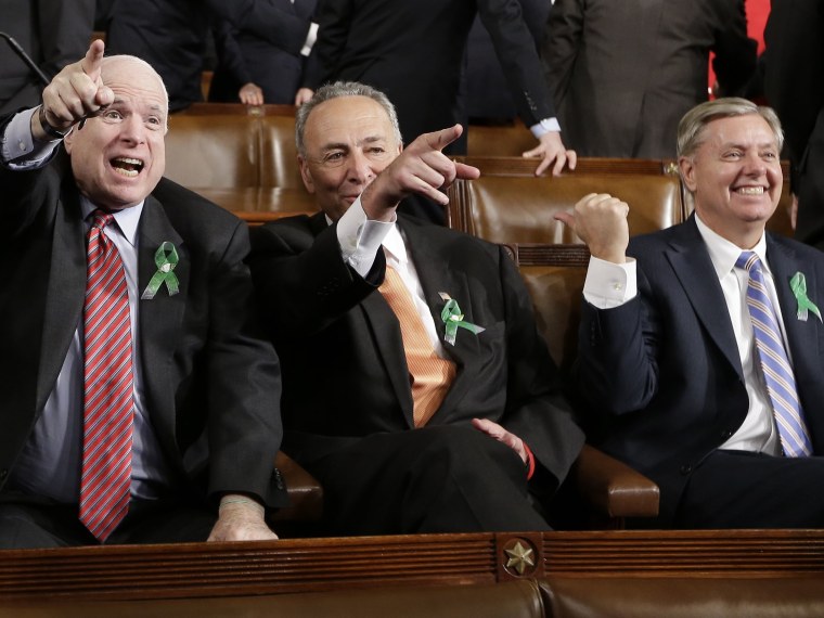 From left, Sen. John McCain, R-Ariz., Sen. Charles Schumer, D-N.Y. and Sen. Lindsey Graham, R-S.C. sit on Capitol Hill in Washington, Tuesday, Feb. 12, 2013, before President Barack Obama's State of the Union address during a joint session of Congress....