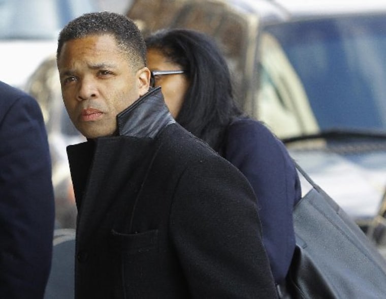 Former Chicago congressman Jesse Jackson Jr. enters the U.S. District Federal Courthouse in Washington February 20, 2013. Jackson, son of the famed civil rights leader, plans to plead guilty to charges filed on 15 February accusing him of misusing $750...