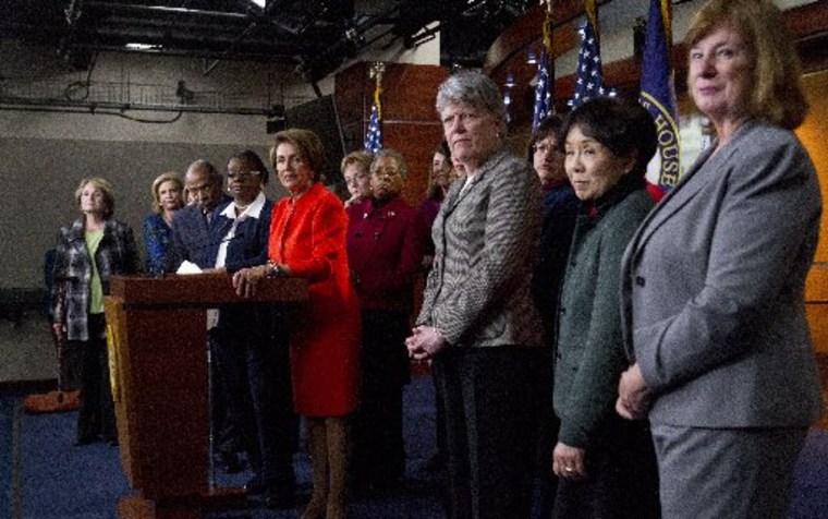 File photo: House Minority Leader Nancy Pelosi of Calif., center, accompanied by fellow House Democrats, leads a news conference on Capitol Hill in Washington, Wednesday, Jan. 23, 2013, to discuss the  reintroduction of the Violence Against Women Act. ...