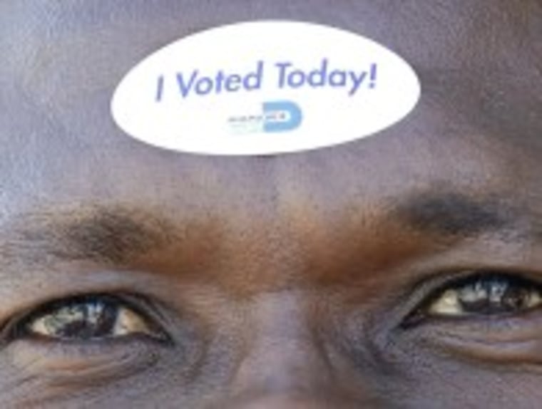 Jean Robert Soutien displays on his forehead the sticker he received after voting during the U.S. presidential election in North Miami Beach, Florida November 6, 2012. (Photo by Andrew Innerarity/REUTERS)