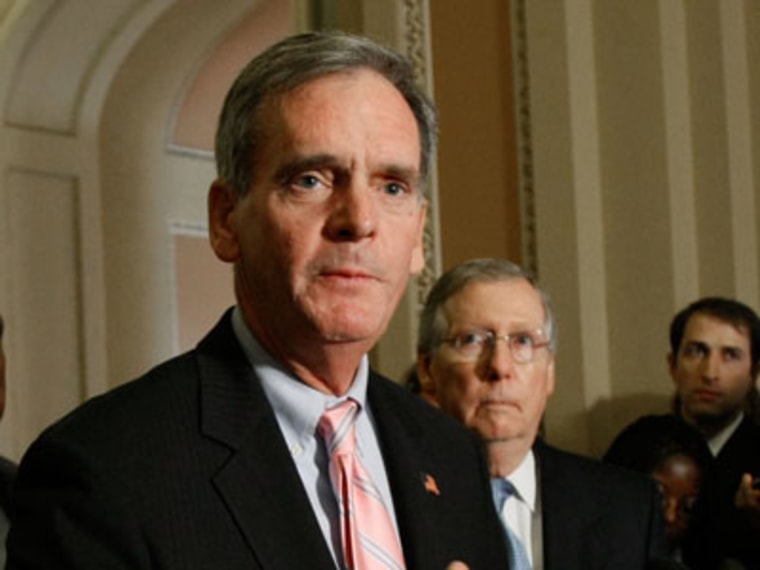 Now former-Sen. Judd Gregg, R-N.H., speaks while flanked by Senate Minority Leader Mitch McConnell, R-Ky., after a policy luncheon on Capitol Hill October 1, 2008 in Washington, DC. (Photo by Mark Wilson/Getty Images)