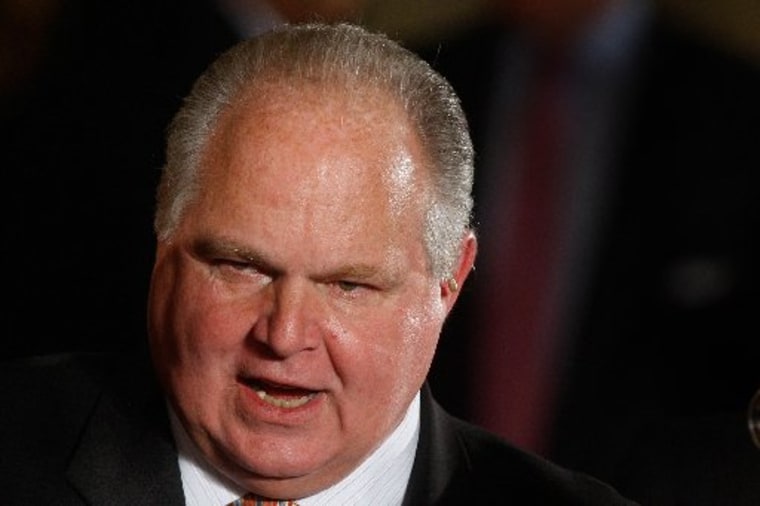 Conservative talk show host Rush Limbaugh talks with guests in the East Room of the White House in Washington, Tuesday, Jan. 13, 2009, prior to a Presidential Medal of Freedom ceremony for Colombian President Alvaro Uribe, former British Prime Minister...
